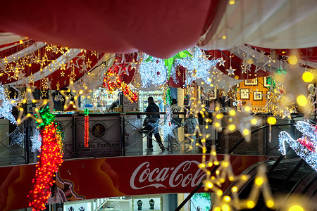 People seen enjoying Christmas and New Year decoration with colourful lights at the shopping mall.