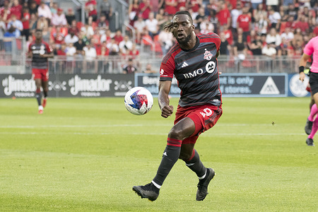C.J. Sapong #9 (R) in action during the game between Toronto FC and Real Salt Lake at BMO field in Toronto.
 The game ended 0-1 for Real Salt Lake