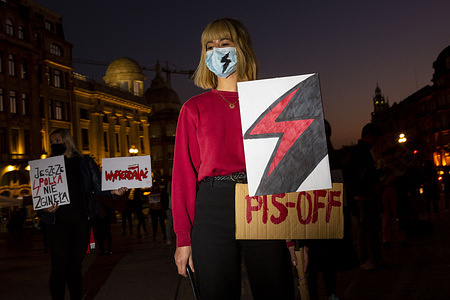 A woman holding a placard expressing her opinion during the demonstration.
Around 300 people gathered at Aliados Avenue to show solidarity to protests due to the rules of abortion after Poland's Constitutional Tribunal ruled that abortion in cases of irreversible damage to the fetus is unconstitutional.