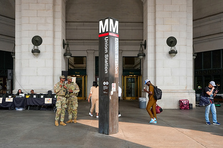 A national guardsman stands at the Union Station metro stop, Friday, September 5, 2025, in Washington. President Trump has deployed troops to the nation's capital under the guise of reducing crime.