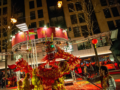 Chinese dragon dance during the Chinese New Year celebrations.
Chinese around the world celebrated the Lunar New Year. This New Year is Year of Pig according to the Chinese zodiac. The pig ranks 12th in the zodiac and is a symbol of wealth and good fortune. In Amsterdam hundreds of people gathered at the famous Dam square to celebrated it with lion dances and a lot of fireworks.
