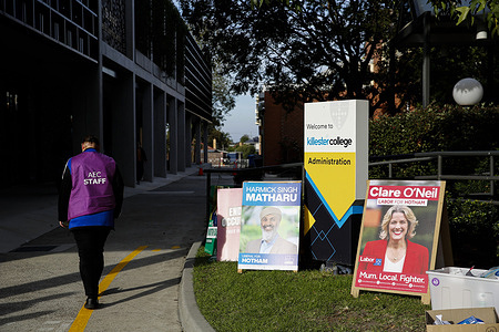 Campaign posters and signs are seen outside a polling centre on election day during the Australian federal election. On election day 3 May 2025, voters in the Division of Hotham cast their ballots at polling places including Killester College in Springvale. The seat held by Labor MP Clare O’Neil since 2013 is being contested by Liberal candidate Harmick Singh Matharu, Greens candidate Martin Barry and others. Key issues in the electorate include cost of living pressures, housing affordability and infrastructure development. Hotham encompasses a diverse, multicultural population in southeast and the election outcome will contribute to the broader picture of voter sentiment in outer-metropolitan Australia during the 2025 federal election.