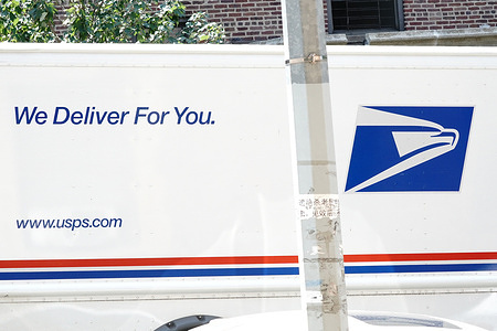 USPS sign on delivery truck in Flushing, Queens. 
USPS delays endanger 14M who won’t get medications on time, report says.