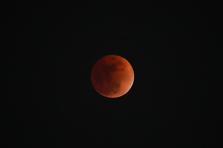The moon is seen during a full "Blood Moon" lunar eclipse