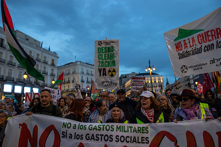 Protesters placards and banners expressing their opinion during a demonstration. A demonstration is staged under the slogan “No to War,” organized by the Internationalist Assembly of Madrid, held this week in Madrid.
