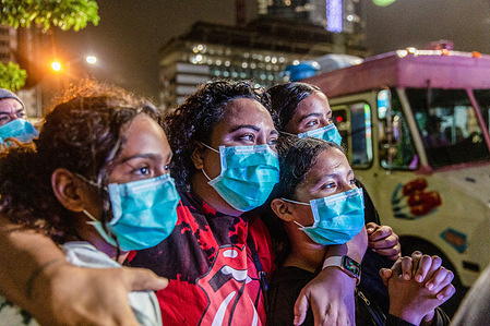 Supporters of Joe Biden gather on Biscayne Boulevard to watch the President Elect and Vice President Elect Kamala Harris address the nation with victory speech in the hours after it was announced that he had won the United States Presidential Election.