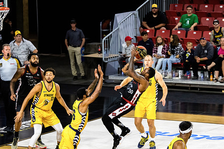 Junior Cadougan (30) of Edmonton Stingers seen in action during the 2021 Canadian Elite Basketball League between The Ottawa Black Jacks and The Edmonton Stingers at Edmonton Expo Centre.
(Final score; Ottawa Black Jacks 87:104 Edmonton Stingers)
