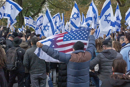 Israeli expats and supporters with Israeli flags participate in a Candlelight Vigil for the 1400 victims of the October 7 Hamas terrorist attacks in Israel at Central Park in New York City. Thousands of civilians, both Palestinians and Israelis, have died since October 7, 2023, after Palestinian Hamas terrorist based in the Gaza Strip entered southern Israel in an unprecedented attack triggering a war declared by Israel on Hamas.