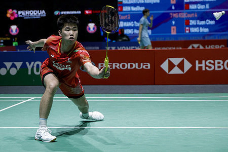 Weng Hong Yang of China plays against Wang Tzu Wei of Chinese Taipei (not in view) during the Men's Single Round 32 match of the Perodua Malaysia Masters 2026 at Unifi Arena. Wang Tzu Wei of Chinese Taipei won against Weng Hong Yang of China with the final score of 21-17, 19-21, 21-18.