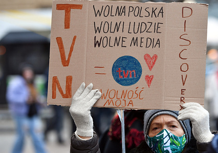 A woman holds a placard saying "TVN, Free Poland, Free People, Free Media - My Freedom” during the demonstration. 
Protest in defense of free media after the adoption of the so-called Lex-TVN in the Sejm in the Polish Parliament, which forces the sale of TVN by the American owner.