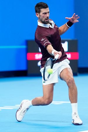 Novak Djokovic of Serbia plays against Alex De Minaur of Australia (not in view) during the Men's Singles final match on day seven of China Open at the National Tennis Center. Novak Djokovic defeated Alex de Minaur 7-6(3), 1-0 (ret.)