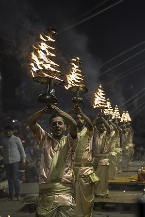 Hindu priests are seen performing at the Aarit ceremony on the banks of the Ganges river.
Varanasi is a city in India which lies on the banks of the Ganges River. It draws Hindu pilgrims from all parts of India who come to bathe in the river, which is a dedication to the Hindu God Shiva.