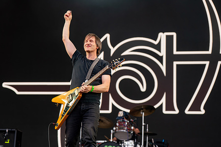 Tim Wheeler of the band Ash seen performing live on stage during the Heritage Live music festival. Heritage Live music festival was held at The Audley End Estate in Essex. Bands playing were Ash, The Charlatans and The Manic Street Preachers, Opening and the day was a DJ set from Chris Moyles who then hosted the days event by introducing the bands to the stage.