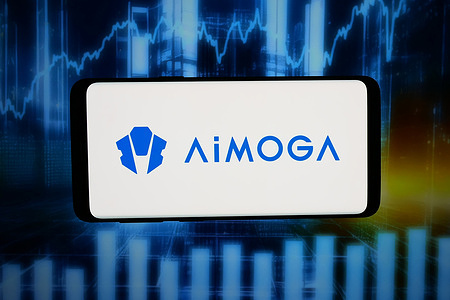 In this photo illustration, the logo of Chinese robot company AiMOGA Robotics is displayed on a smartphone in front of abstract background on computer screen.