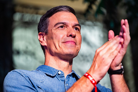Pedro Sanchez, Spanish prime minister and secretary of the PSOE party, celebrates the good results achieved on the election night of 23 July 2023 in the street with the crowd in front of the national headquarters of the PSOE party in Madrid.