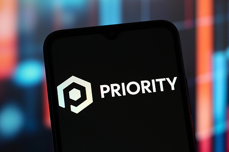 In this photo illustration, the Priority Technology Holdings logo is seen displayed on a smartphone screen.