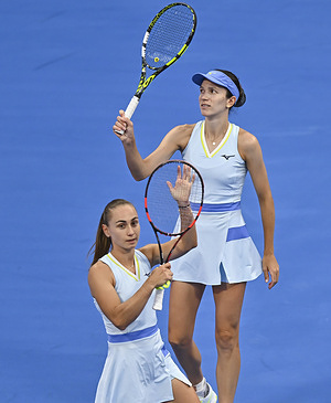 Anna Danilina (L) of Kazakhstan and Aleksandra Krunic (R) of Serbia celebrate after winning their Women's doubles semifinal match against Gabriela Dabrowski of Canada and Luisa Stefani of Brazil (not in view) at the WTA Qatar TotalEnergies Open 2026 tennis tournament at the Khalifa International Tennis Complex.
   Anna Danilina/Aleksandra Krunic won against Gabriela Dabrowski /Luisa Stefani. 6-3,6-4.