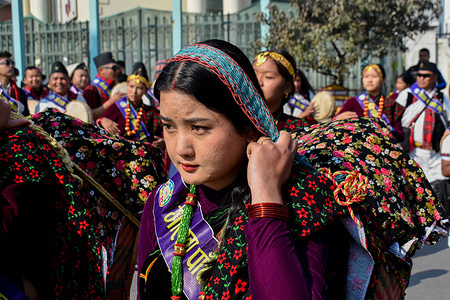Nepalese Indigenous women from the Gurung community wearing traditional attire seen singing and dancing with their instruments as they take part in the parade to mark the New Year Tamu Lhosar festival.