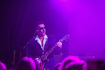 Naim Cortazzi - vocals and guitarists of the fun lovin criminals performs at Locomotiv club in Bologna.