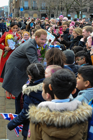 The Duke of Sussex "Prince Harry" seen greeting local school children during the official visit at Birkenhead. Meeting local school children and members of public, before visiting the Townhall, Hamilton Square Birkenhead Liverpool.