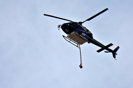 A water bomber helicopter of the Marines Pompiers de Marseille is seen in the airspace.
