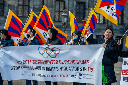 A group of Tibetan men seen holding a big banner against the violations of human rights in China during the demonstration.
 The Tibetan community in The Netherlands organized a demonstration against the celebration of the Olympic Games in Beijing. According to a statement from over 240 nongovernmental organizations, including the International Campaign for Tibet, calling for a diplomatic boycott and other actions related to the 2022 Beijing Winter Olympics. The groups urged governments to join a diplomatic boycott of the Games, slated to begin February 4, 2022, and for athletes and sponsors not to legitimize government abuses.
