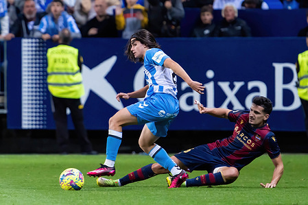 Alex Calvo of Malaga CF and Álex Muñoz of Levante UD seen in action during the LaLiga Smartbank match between Malaga CF and Levante UD at La Rosaleda Stadium.
Final Score: Malaga CF 0-0 Levante UD