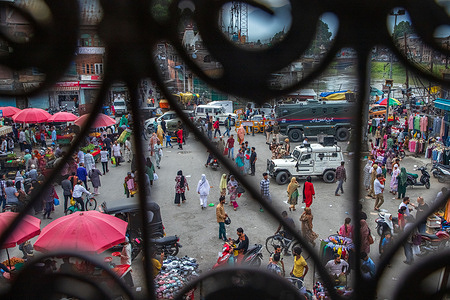 Kashmiri people seen shopping ahead of Muslim festival Eid-Al-Adha at a local market.