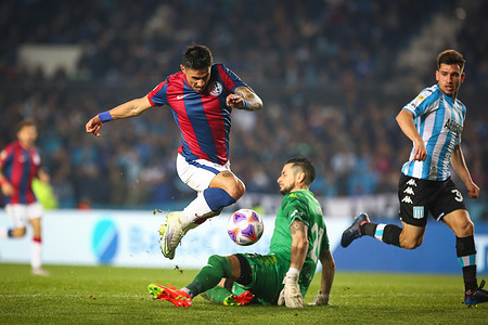Adam Bareiro of San Lorenzo and Gabriel Arias of Racing seen in action during a match between Racing and San Lorenzo as part of Copa de la Liga Profesional de Futbol at Presidente Peron Stadium.
(Final score: Racing 1 - 2 San Lorenzo)