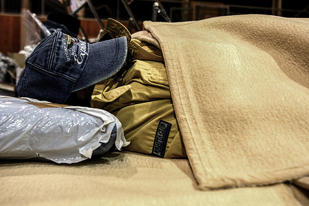 The body of Satoshi Ishikawa, 66, lies on the ground as if asleep in Ishinomaki, Miyagi Prefecture, Japan, after the devastation caused by the March 11, 2011 Great East Japan Earthquake and tsunami.