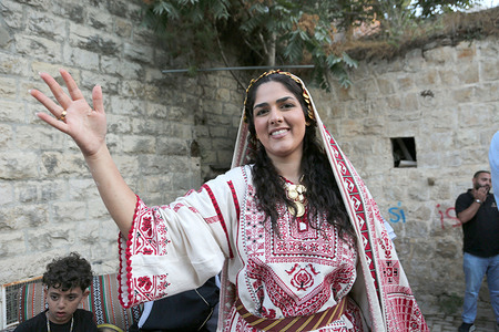 A Palestinian bride seen dancing to traditional music during a wedding celebration held in the town of Birzeit, north of Ramallah . A Palestinian wedding ceremony features traditional wedding rituals and the popular Dabke dance.