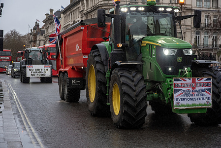 Tractors circle on the Parliament Square during the demonstration in London. A group of farmers with tractors held a go slow demonstration in central London, while the British Prime Minister, Keir Starmer was facing with the Prime Minister's Questions at the Parliament. Protesters demand Keir Starmer and the Labour government to resign and have a general election.