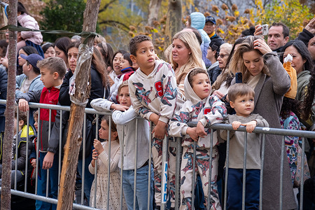 Children watch the Bluey balloon getting blown up behind barricades. Every year since 1994, Macy’s holds The Macy's Balloon Inflation Celebration on the Wednesday before Thanksgiving. Held on the Upper West Side alongside the Museum of Natural History. The public is invited to view the inflation of the massive balloons that will be included in the Macy’s Thanksgiving Day Parade.
This year 4 new featured characters will be introduced Buzz Lightyear, Mario, PACMAN and Shrek’s Onion Carriage.