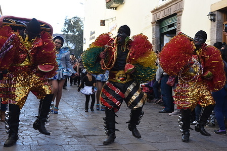 Revellers wearing traditional costumes dance during the festival.
The Nativity Virgin (Virgen de Natividad) festival, one of the most important traditional celebrations in Cusco, it is celebrated in the neighbourhood of Almudena. Devotees to the Virgin carry her statue through the streets followed by musicians and hundreds of dancers wearing traditional costumes.
