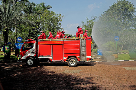 Firefighters disinfect the Ragunan Zoo as they prepare to reopen amid coronavirus crisis.