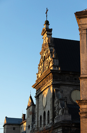 The Bernardine Church is seen standing ,this historic religious structure maintains its architectural integrity amidst the ongoing regional war. The majestic facades and domes of Lviv stand today as silent witnesses to resilience, preserving history under the constant threat of missile strikes and drone attacks. Despite frequent air raid sirens and protective shielding on ancient stained-glass windows, the city's architectural heritage remains an unbroken symbol of Ukraine's connection to European civilization. Every spire and bas-relief captured here serves as a reminder of the fragility and, simultaneously, the incredible strength of the culture we defend during these difficult times.