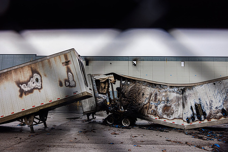 Semi-trailer trucks are burnt after a fire hit the Walmart fulfillment center in Plainfield, Ind. The 1.2 million square foot building fire began Wednesday around noon and wasn't contained until Friday. The Bureau of Alcohol, Tobacco, Firearms, and Explosives (ATF) will investigate the cause of the fire. No one was injured in the blaze.