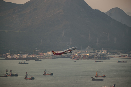 Hong Kong Airlines aircraft takes off at Hong Kong International airport.
Coronavirus hitting hard across the globe, many countries decide to lock down. Some airlines promoting discount while others adding flights to help overseas residents to return home.