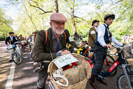 Participants are seen riding past Birdcage Walk near St James’s Park as they take part in The Tweed Run. A cycling event through central London where hundreds of riders dressed in traditional tweed attire ride vintage and modern bicycles. The annual event celebrates British style and heritage, with cyclists following a set route through the capital and stopping at landmarks along the way. The ride combines fashion, cycling culture, and social gathering, attracting enthusiasts and spectators across the city.