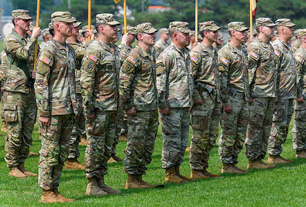 U.S. Army soldiers attend a transfer of authority ceremony between the 1st Sticker Brigade Combat Team of the 4th Infantry Division and the 1st Striker Brigade Combat Team of the 2nd Infantry Division at Camp Casey. The event marks the nine-month dispatch of the 1st Striker Brigade Combat Team of the 4th Infantry Division to South Korea.