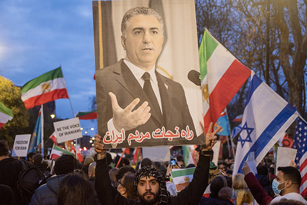 A protester holds a photo of the Crown Prince of Iran, Reza Pahlavi during the demonstration outside the Iranian Embassy in London. Hundreds of Iranian royalists gathered outside the Iranian Embassy in London, UK. Protesters want to show their support to the anti-government protesters in Iran. Demonstrators intend to replace the Supreme Leader of Iran, Ayatollah Ali Khamenei, and his regime with the Crown Prince of Iran, Reza Pahlavi who lives in exile at the United States.