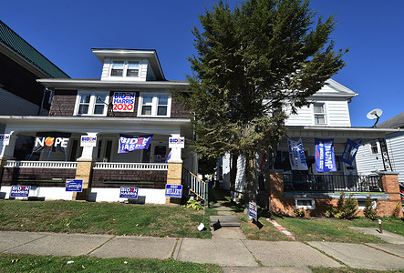Neighbours at 388 and 386 Ridge Street have been adding to their collection of presidential merchandise to outdo one another.
 The 2016 presidential election turned Luzerene County from blue to red when Trump won the election in a landslide. The communities since then have been divided and again this election season are politically divided.