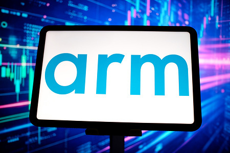 In this photo illustration, the Arm logo is seen displayed on a tablet screen.