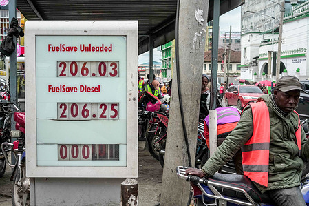 A boda boda rider seen sitting on his motorcycle beside a fuel price board. Kenya has sharply increased fuel prices, citing global supply constraints linked to the ongoing USñIsraelñIran conflict. The Energy and Petroleum Regulatory Authority (EPRA) raised diesel by KSh 40.30 (24.2%) to KSh 206.84 per litre, while petrol increased by KSh 28.69 (16.1%) to KSh 206.97 per litre. Kenya has sharply increased fuel prices, citing global supply constraints linked to the ongoing US–Israel–Iran conflict. The Energy and Petroleum Regulatory Authority (EPRA) raised diesel by KSh 40.30 (24.2%) to KSh 206.84 per litre, while petrol increased by KSh 28.69 (16.1%) to KSh 206.97 per litre.