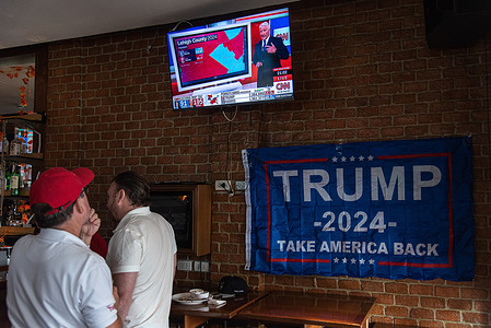 Supporters of the Republican Party seen watching the broadcasting of the U.S. election results at the restaurant in Bangkok. Voters across the US cast ballots on 05 November for the 47th President of the United States between Donald J. Trump from the Republican Party and US Vice President Kamala Harris from the Democratic Party.