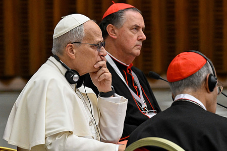 Pope Leo XIV (L) attends the Extraordinary Consistory, a two-day gathering of the world's cardinals in the Vatican.