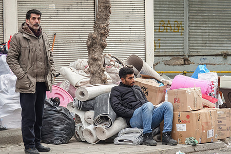 Two men with their rescued belongings from their buildings damaged in the earthquakes in Diyarbakir. Turkey and Syria have experienced the worst earthquakes to strike the region in almost a century. A 7.8-magnitude quake struck southeastern Turkey, which was followed by a second quake of 7.7 in northern Syria. More than 50,000 people are reported to have died due to the quakes, and the death toll is still rising. This earthquake damaged 25,000 buildings which are not safe to live in. Hence, 250,000 residents are left homeless after the earthquake. These residents take shelter in a tent made of linoleum or in safe shelters. As the cold weather continues in the region, this has badly affected the health of the earthquake victims, especially women, and children