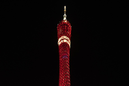 An illuminated Canton Tower seen at Canton Tower Plaza in Guangzhou. The Canton Tower is a 602-meter high located at an intersection of Guangzhou New City Central Axis and Pearl River in Guangzhou, China.