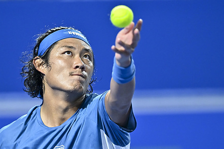 Zhizhen Zhang of China seen in action with Jakub Mensik of Czech Republic (not in view) during their men's singles round of 16 match at the ATP Qatar Exxonmobil Open 2026 tennis tournament at the Khalifa International Tennis Complex.    Jakub Mensik won against Zhizhen Zhang 6-3, 6-2