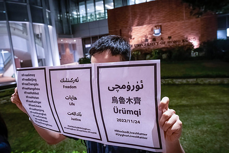 A protester holds a placard expressing his opinion during the demonstration. As Beijing continues pursuing the Zero-covid-19 policy, mainland Chinese students at the University of Hong Kong protest against the policy. The new wave of protests was one of the major opposition voices out since the 1989 June 4 Tiananmen Square protests.